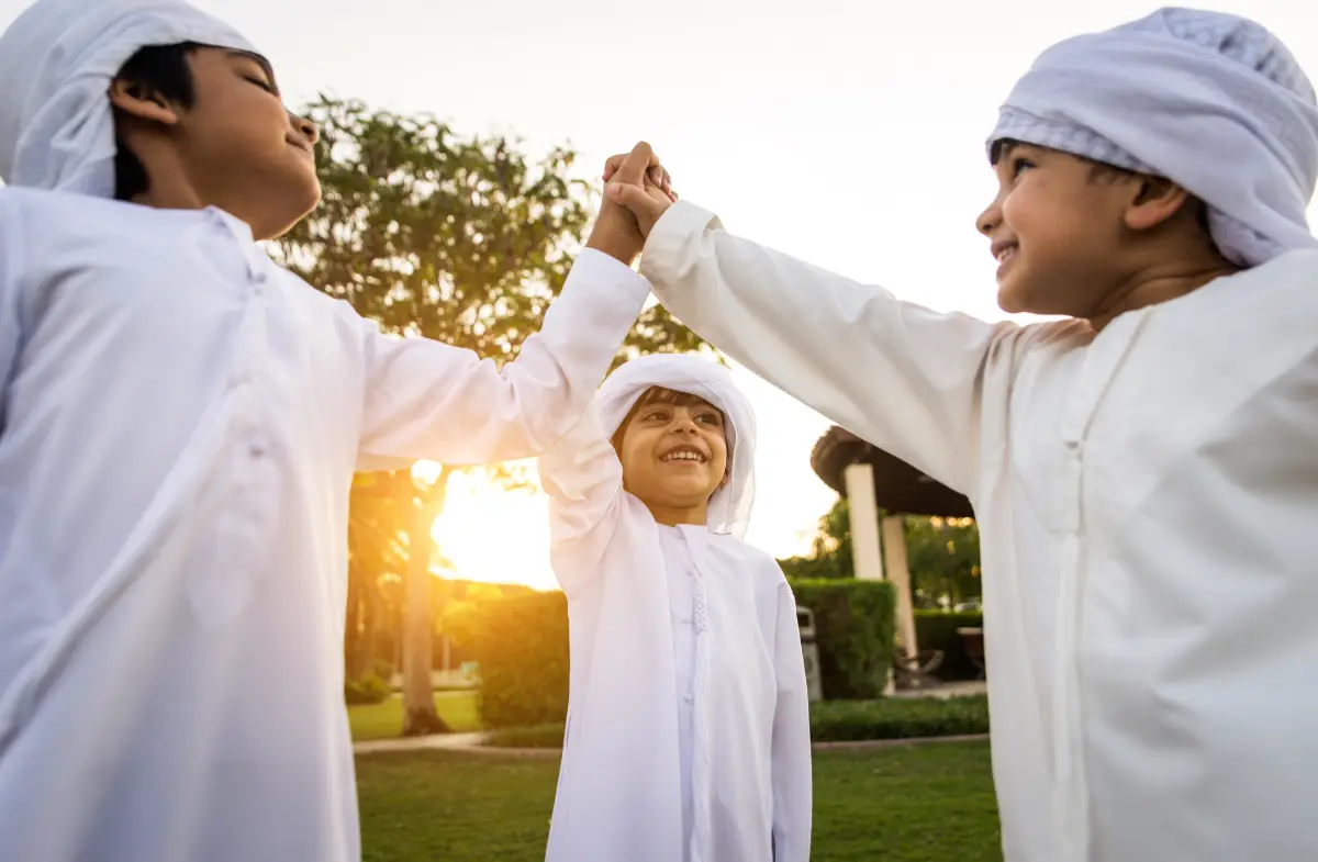 A group of bedouin kids holding hands in unity